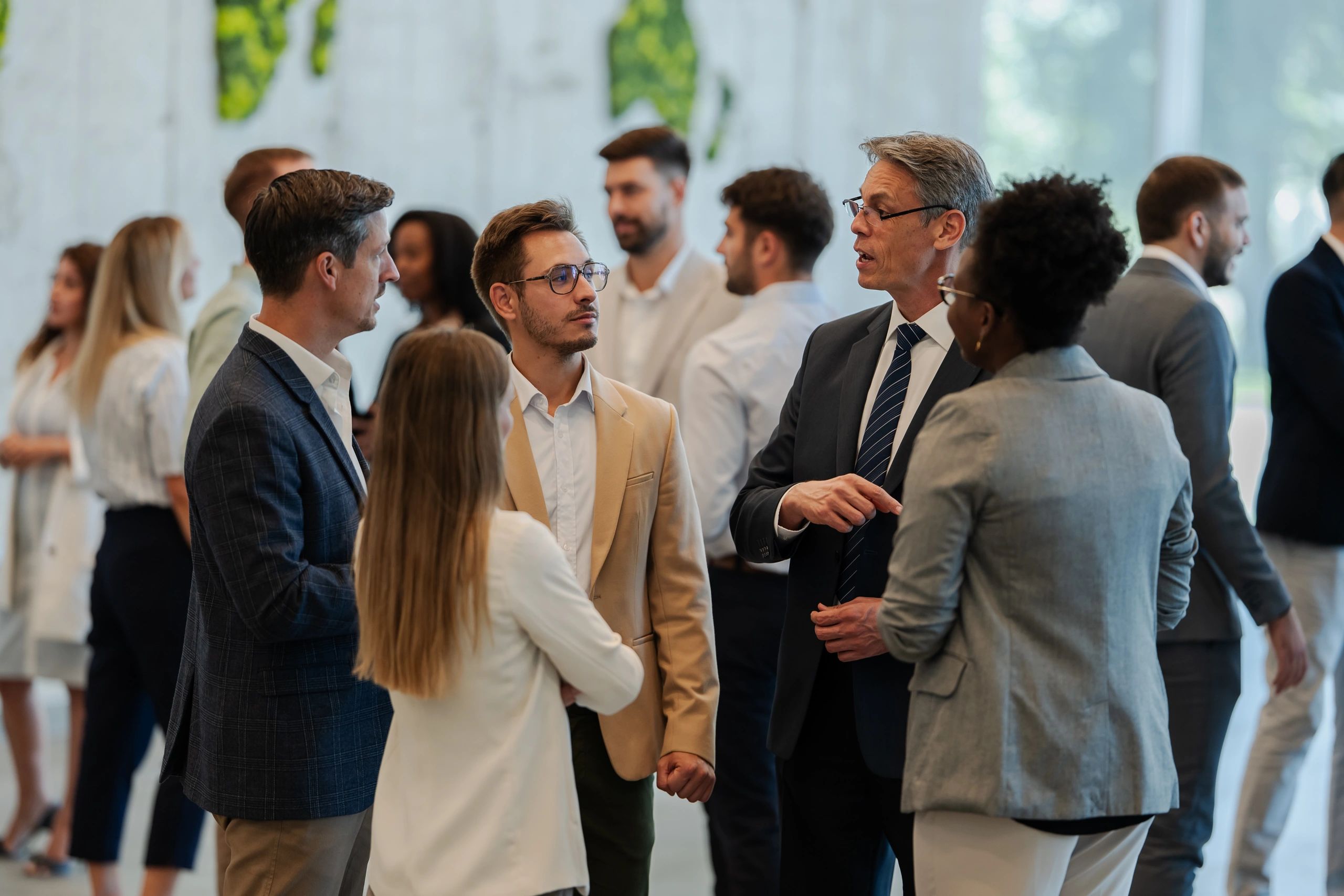 Professionals discussing during a conference